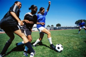 Girls-playing-soccer-300x199